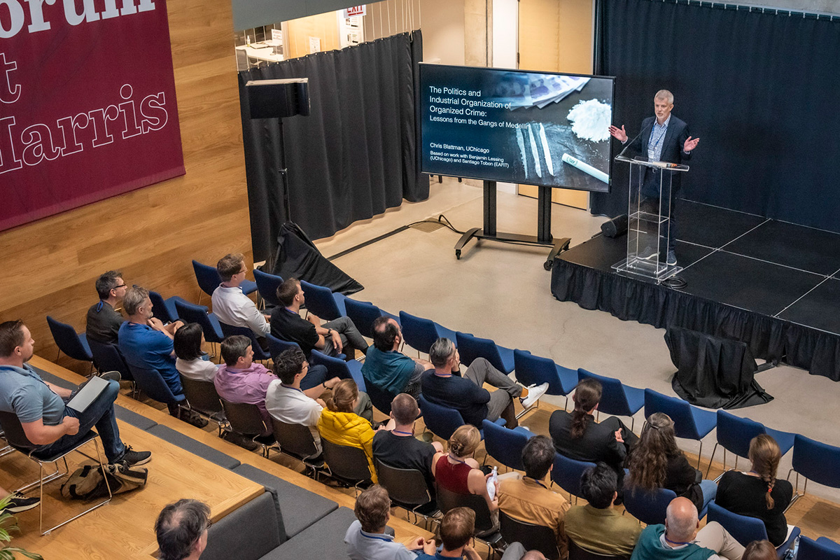 SIOE conference photo: Scott Gehlbach introducing the keynote at the Harris Forum.